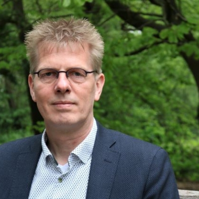 Portretfoto van J.H. -Jan Huisjes, financieel adviseur
