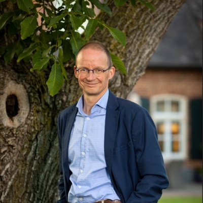 Portretfoto van JHEH (Hugo) Vossen, financieel adviseur