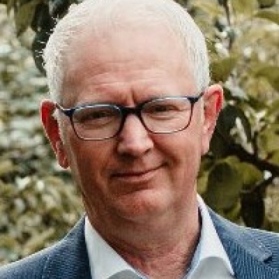Portretfoto van C.P.H. (Cor) Dammers, financieel adviseur