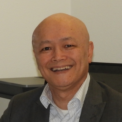 Portretfoto van W.Y.(Wing) Tang, financieel adviseur