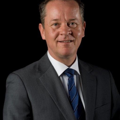 Portretfoto van J.E. (Eduard) Jansen, financieel adviseur