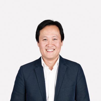 Portretfoto van Chi-Ming Chan, financieel adviseur