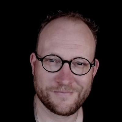 Portretfoto van M.G.(Michel) de Rue, financieel adviseur