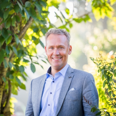 Portretfoto van J.G. (Jan Gerrit) Hof, financieel adviseur