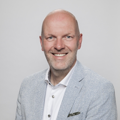 Portretfoto van A.H.A. (Henk) Jansen, financieel adviseur